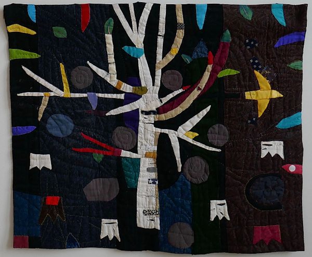 Patchwork 27x33' 1935

This quilt was done after a residency in Finland in the town where my ancestors left to come to America.  The cemetery in Alajarvi has a lot of very old ornate wrought iron headstones with the name Koskenmaki
and there is a road leading to their farm called Koskenmaentie.  This is my homage to our ancestors who left home to find a better life.